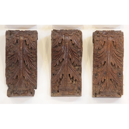 455 - Three 16th century leaf carved corbels, 24cm long together with three 19th century examples 55.5cm l... 