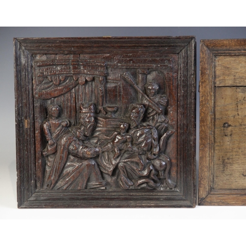 456 - A 17th century carved oak fragment panel of the annunciation, later mounted, 28cm H x 29.5cm W, toge... 