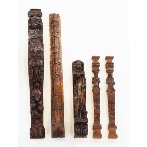 469 - A 15th century croquet spire pilaster, 73cm long, a 17th century Flemish pilaster, 77cm long, an oak... 