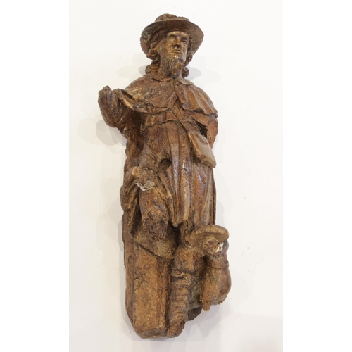 471 - A 16th century carved pine and polychrome painted figure of St Roch, southern European, 97cm high