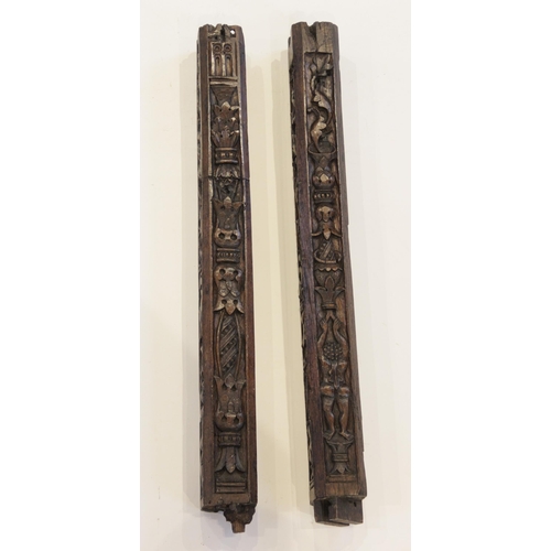 472 - A pair of carved oak pillars, possibly part bed posts, circa 1500 and later, of canted square sectio... 