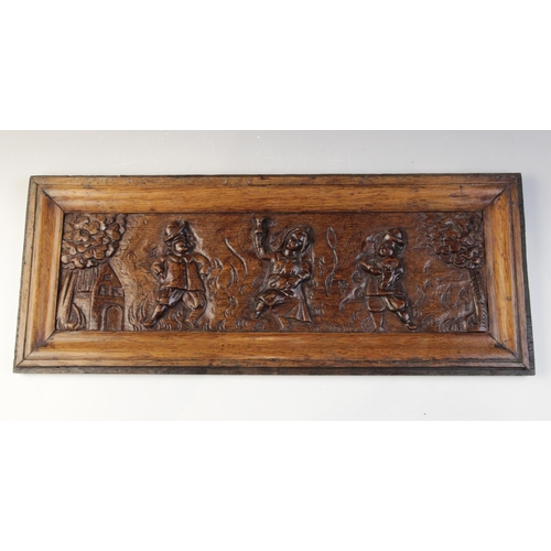 473 - A late 17th century naïve carved oak panel, designed with three dancing figures, 22cm x 53cm, a Roma... 