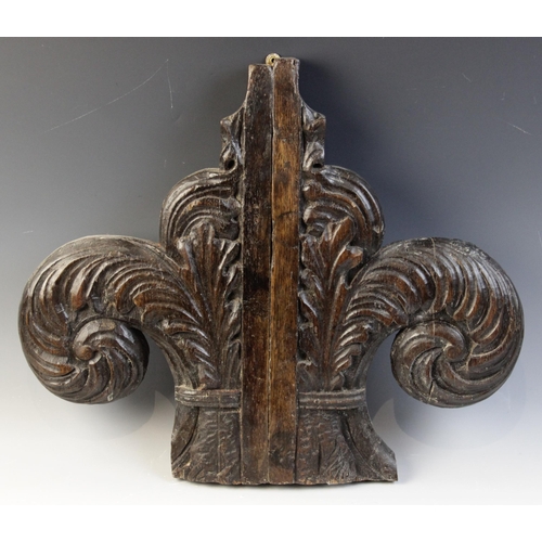 474 - A 17th century carved walnut chair back, Swiss, carved as a double headed eagle with pierced centre ... 