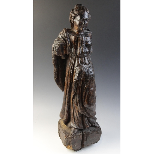 478 - A 16th century carved pine figure of a female, European, modelled standing in flowing robes, 62cm hi... 