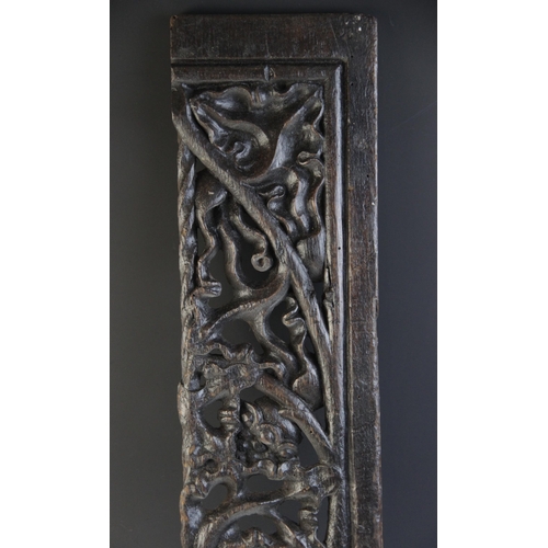 481 - An early 16th century carved oak panel, English, circa 1520, with fruiting vine, 18.5cm x 40cm toget... 