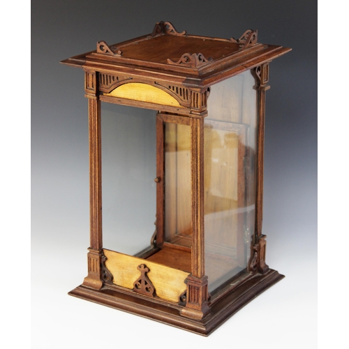 485 - *A mid-19th century mahogany cased glass display case, the square moulded top applied with an open w... 