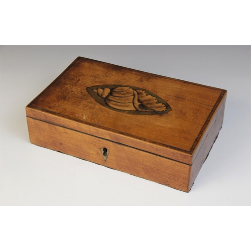 493 - A George III burr yew wood octagonal tea caddy, the hinged cover inlaid with star detail, opening to... 