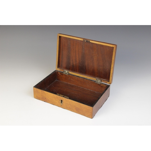 493 - A George III burr yew wood octagonal tea caddy, the hinged cover inlaid with star detail, opening to... 