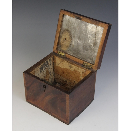 493 - A George III burr yew wood octagonal tea caddy, the hinged cover inlaid with star detail, opening to... 