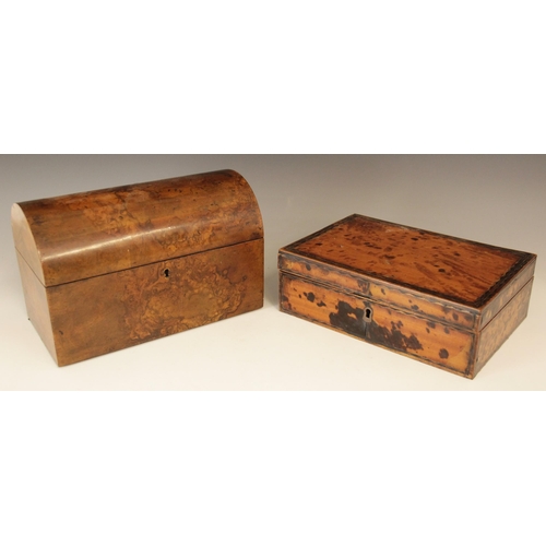 495 - A 19th century burr walnut tea caddy, of rectangular domed form, the hinged cover opening to a centr... 