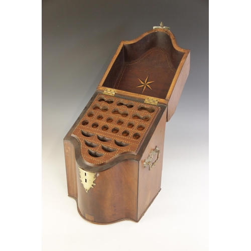 497 - A George III mahogany knife box, of typical serpentine form, applied with brass swing handles and cl... 