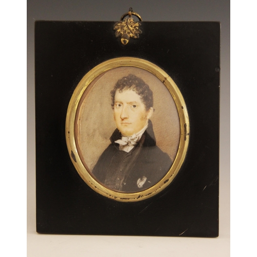 50 - English school (19th century), 
A portrait miniature depicting a frock coated gentleman bust length,... 