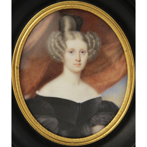 52 - English school (late 18th century), 
A portrait miniature depicting a young lady in half mourning dr... 