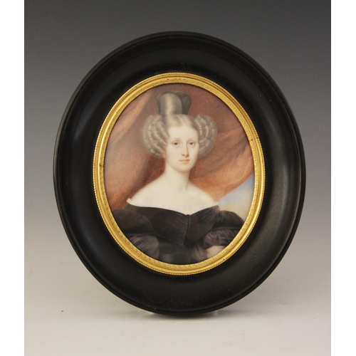 52 - English school (late 18th century), 
A portrait miniature depicting a young lady in half mourning dr... 