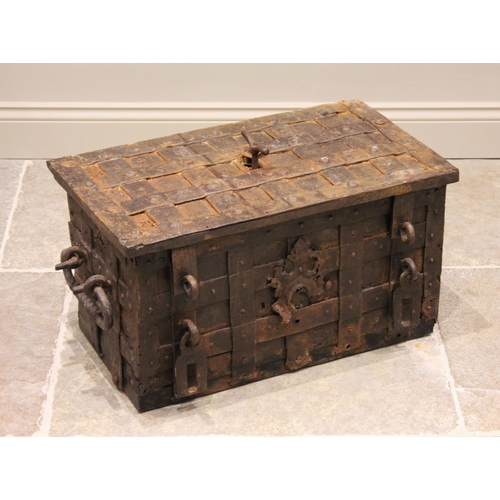 521 - A 17th century iron strapwork safe box (Corsair), probably German, Nuremberg, of strap and rivet con... 