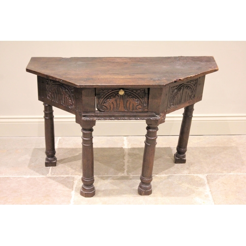 524 - A 17th century and later oak credence type table, the board top with single drop leaf above a single... 