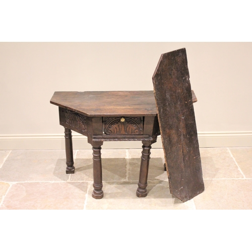 524 - A 17th century and later oak credence type table, the board top with single drop leaf above a single... 