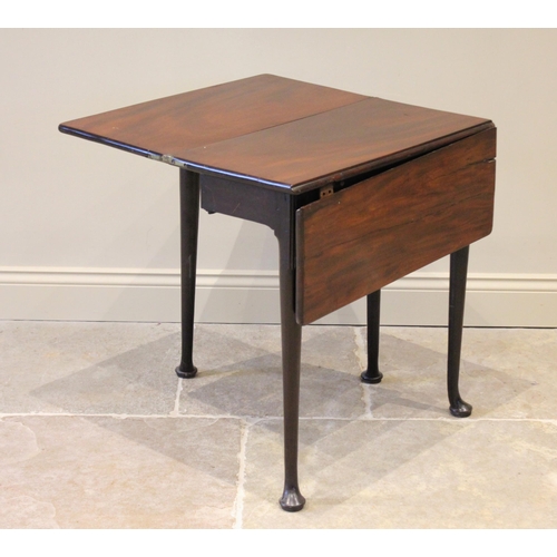 531 - A George II mahogany fold over and single drop leaf table, the rectangular folding top above a singl... 