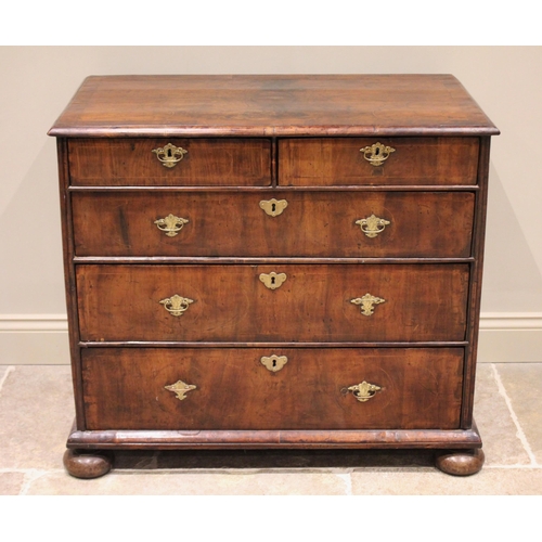 542 - A William and Mary figured walnut chest of drawers, the rectangular crossbanded top inlaid with cord... 