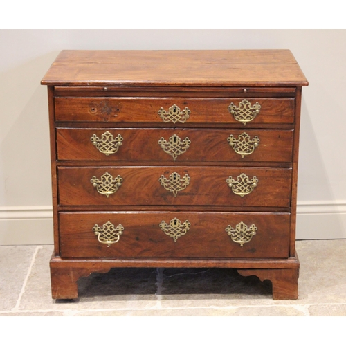 545 - An early 18th century figured walnut bachelors chest of drawers, the rectangular top with a moulded ... 