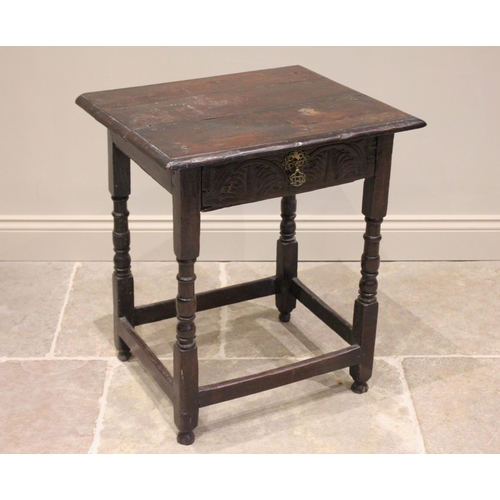 551 - A 17th century and later oak side table, the rectangular three board top above a single frieze drawe... 