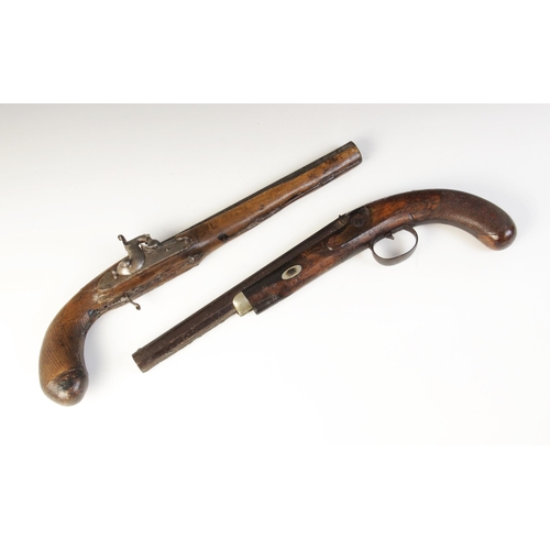 56 - Two 19th century percussion cap pistols, both lacking firing mechanism, with chequered and rounded h... 