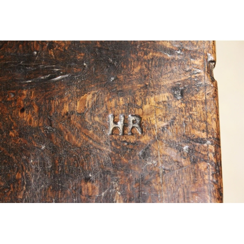 568 - A carved oak chest of drawers, 17th century and later constructed, the three board top with incised ... 