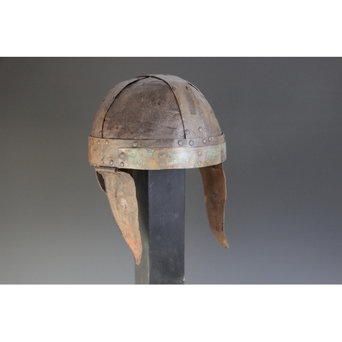 57 - A modern reproduction of a ‘Spangenhelm’ in the style of the 6th century AD, the skull constructed o... 