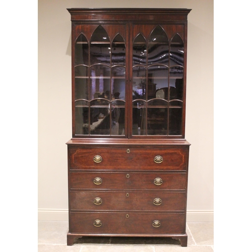 575 - * A George III mahogany secretaire bookcase, the moulded cornice above a pair of Gothic style astrag... 