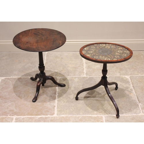 578 - A 19th century mahogany tripod table, the oval glazed top with a floral needlepoint tapestry panel, ... 