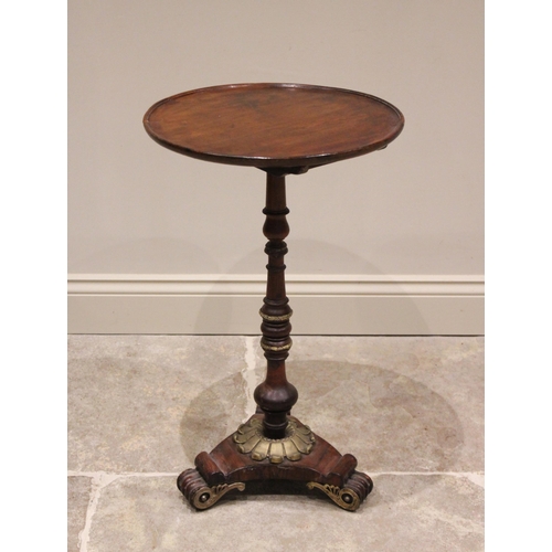 585 - A William IV rosewood pedestal table, the associated mahogany tilt top raised upon a slender ring tu... 