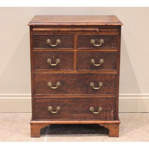 586 - A George III mahogany chest, of cottage proportions, the rectangular moulded top above a brushing sl... 