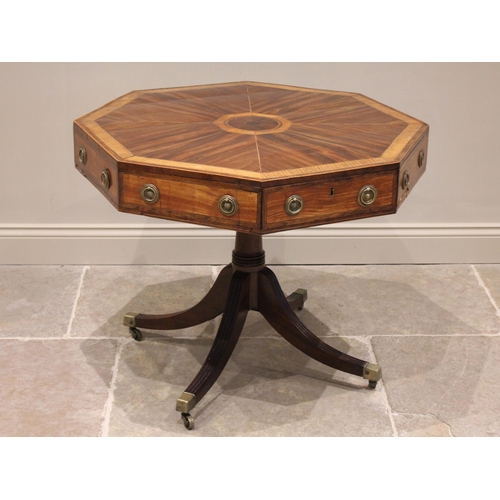 595 - A Regency mahogany and satinwood octagonal drum table, the segmentally veneered top with satinwood b... 