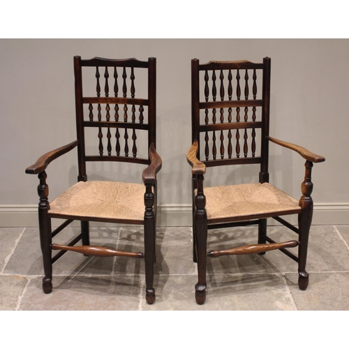 602 - * A harlequin set of eight ash, elm and alder Lancashire spindle back chairs, 19th century, each wit... 