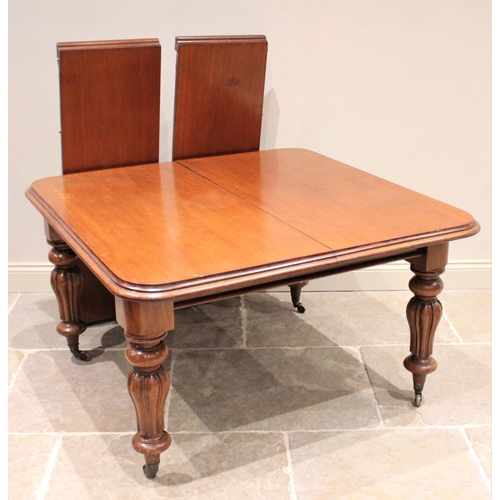 607 - * A Victorian mahogany extending dining table, the rectangular top with rounded corners and a moulde... 