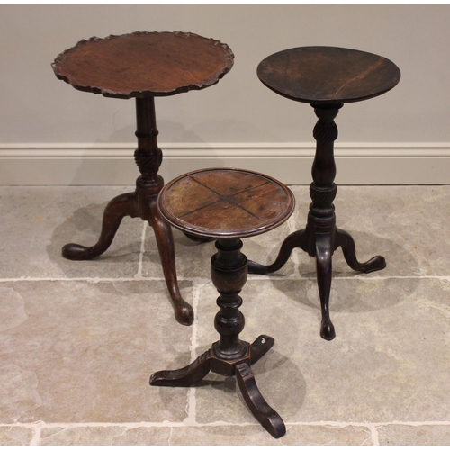 616 - A 19th century mahogany pie crust tripod table, the circular tilt top with moulded and scalloped rim... 