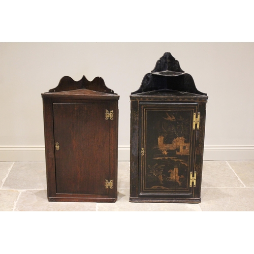 617 - A 19th century black lacquer chinoiserie hanging corner wall cupboard, the single straight front doo... 