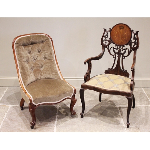 626 - An Edwardian mahogany elbow chair, the 'C' scroll openwork back united by a circular panel inlaid wi... 