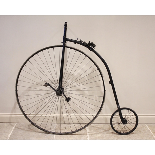 79 - A late 19th/early 20th century and later, Penny Farthing bicycle, the 122cm spoked wheel mounted wit... 