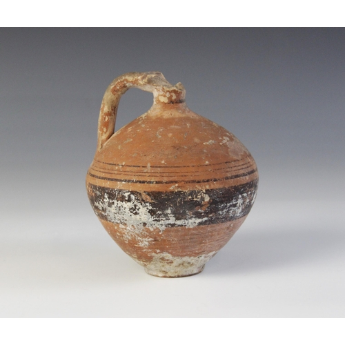 83 - * Ancient Cypriot Iron Age pottery flask c750BC - 700BC, 12cm high (at fault) 

Provenence: Ex colle... 