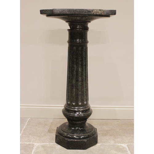 84 - * An Italian carved serpentine pedestal, 19th century, the fluted column below a square section plin... 