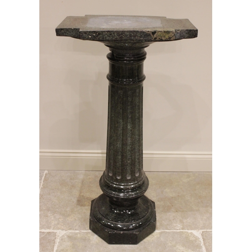 84 - * An Italian carved serpentine pedestal, 19th century, the fluted column below a square section plin... 