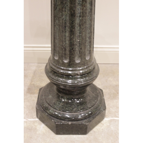 84 - * An Italian carved serpentine pedestal, 19th century, the fluted column below a square section plin... 