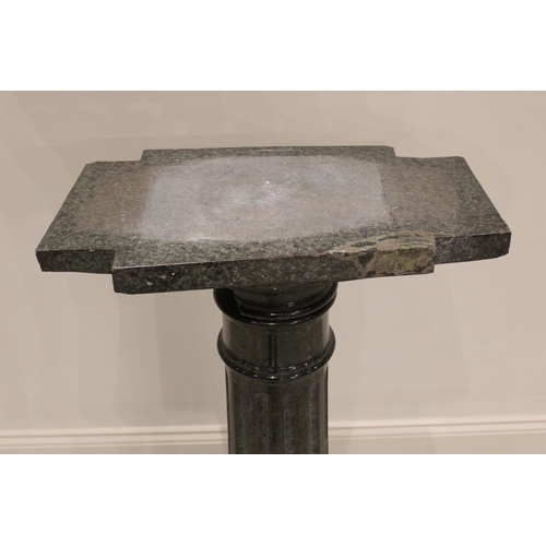 84 - * An Italian carved serpentine pedestal, 19th century, the fluted column below a square section plin... 