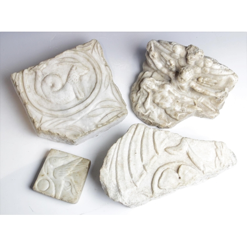 85 - A selection of carved architectural marble fragments, to include a relief carved example depicting a... 