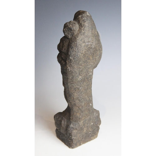 87 - A carved stone model of the Madonna and Child, stylistically modelled on a rocky base, 32.5cm high (... 