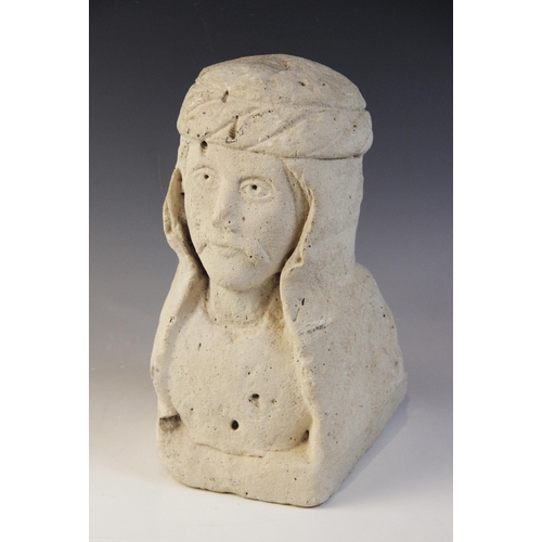 91 - A carved stone corbel depicting the bust of a noble gentleman with moustache and headdress, 31cm hig... 