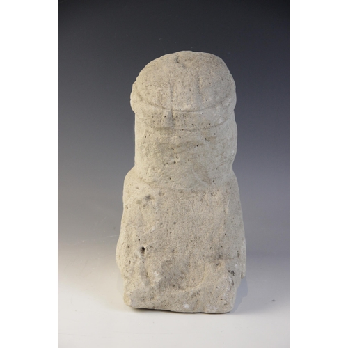 91 - A carved stone corbel depicting the bust of a noble gentleman with moustache and headdress, 31cm hig... 