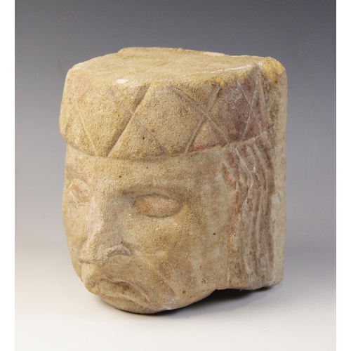 92 - A carved stone corbel, in the medieval style, depicting a gentleman with distinctive hair and hat, 1... 