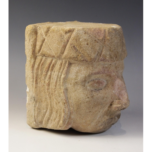 92 - A carved stone corbel, in the medieval style, depicting a gentleman with distinctive hair and hat, 1... 